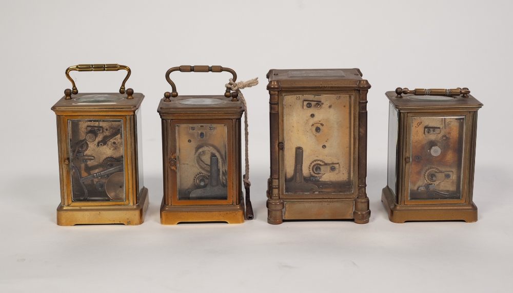 FOUR EARLY 1900's BRASS CASED CARRIAGE CLOCKS, one striking on a bell, one with missing carrying - Image 2 of 3