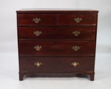 AN EARLY 19TH CENTURY MAHOGANY CHEST OF TWO SHORT AND THREE GRADUATED LONG DRAWERS, ON BRACKET FEET,