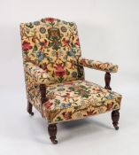 EARLY TWENTIETH CENTURY EASY ARMCHAIR, with arched top rail, flat arms with turned and fluted