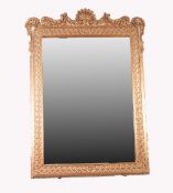 MODERN GEORGIAN STYLE CARVED GILTWOOD WALL MIRROR, the oblong plate housed in an ornate frame,