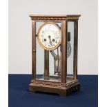 CIRCA 1900 BRASS CASED FOUR GLASS MANTEL CLOCK, the movement striking on a gong with mercury