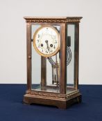 CIRCA 1900 BRASS CASED FOUR GLASS MANTEL CLOCK, the movement striking on a gong with mercury