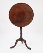 GEORGE III MAHOGANY SNAP TOP TRIPOD OCCASIONAL TABLE, the circular top with raised moulded border,