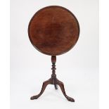 GEORGE III MAHOGANY SNAP TOP TRIPOD OCCASIONAL TABLE, the circular top with raised moulded border,