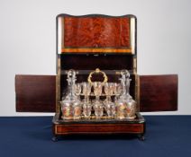 LATE NINETEENTH CENTURY INLAID THUYA, TULIP WOOD CROSSBANDED AND EBONISED SERPENTINE FRONTED TABLE