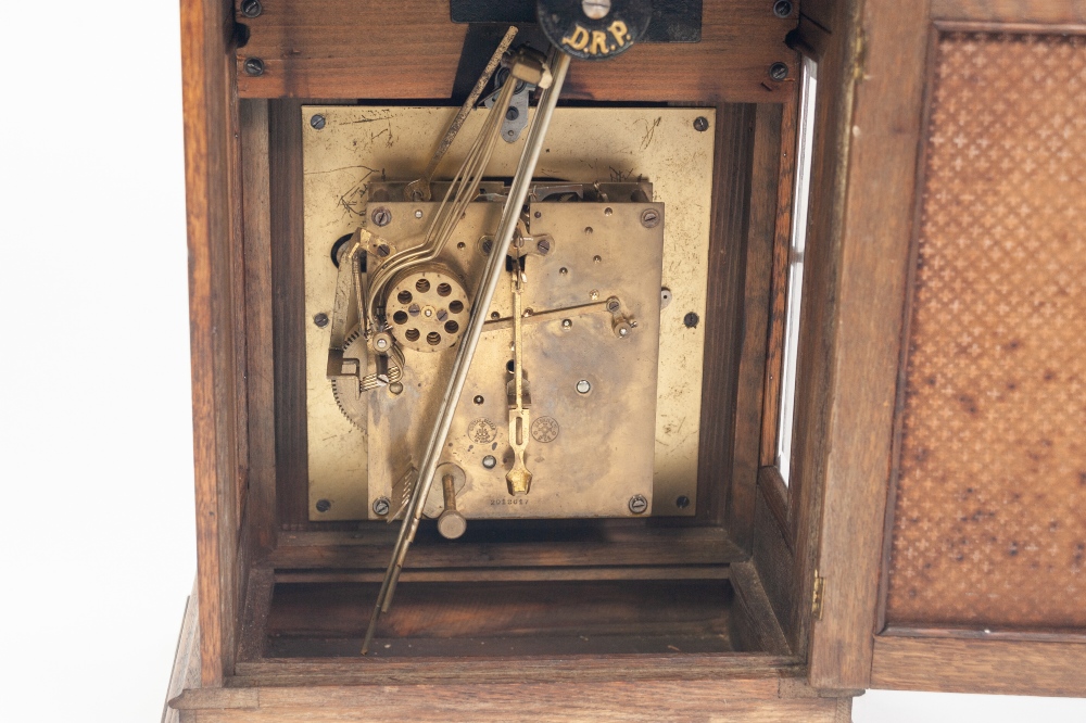 A CIRCA 1900 OAK CASED MANTEL CLOCK, the Gustav Becker three train chiming movement with a - Image 5 of 5