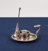 NINETEENTH CENTURY WHITE METAL CIRCULAR CHAMBER CANDLESTICK, with straight gadroon border, free