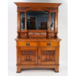 EARLY TWENTIETH CENTURY ARTS AND CRAFTS CARVED OAK MIRROR BACK SIDEBOARD, the canopy top with