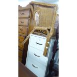 A WHITE FINISH BEDSIDE CHEST OF THREE DRAWERS AND A PINK LOOM TUB ARMCHAIR (2)