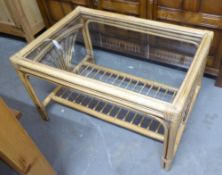 A LACQUERED BAMBOO OBLONG COFFEE TABLE WITH GLASS TOP AND UNDER SHELF