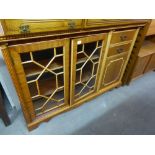 A MAHOGANY SMALL BOOKCASE WITH TWO ASTRAGAL GLAZED DOORS WITH END CUPBOARD AND TWO SHORT DRAWERS