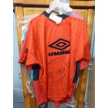 TWO SIGNED MANCHESTER UNITED FOOTBALL SHIRTS 1992/93 AND OTHER SIGNED TELEVISION RELATED EPHEMERA