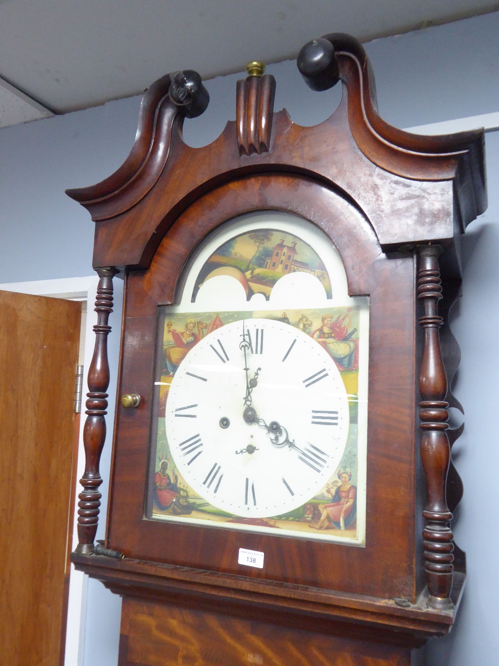 NINETEENTH CENTURY FIGURED MAHOGANY LONGCASE CLOCK WITH ROLLING MOON PHASE, the 14" painted dial