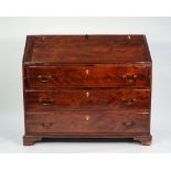 A GEORGE III MAHOGANY STAINED FRUITWOOD LARGE BUREAU, of typical form, the interior simply fitted