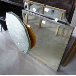 A CIRCUALR FRAMELESS WALL MIRROR WITH FANCY BEVELLED EDGE AND TWO OTHER FRAMELESS WALL MIRRORS (3)