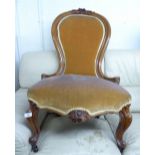 A VICTORIAN WALNUTWOOD FRAMED SPOON BACK LADY'S CHAIR