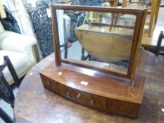 A LATE GEORGIAN STYLE MAHOGANY BOW FRONTED BOX TOILET MIRROR