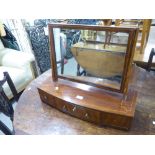 A LATE GEORGIAN STYLE MAHOGANY BOW FRONTED BOX TOILET MIRROR