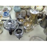 A SILVER PLATE COFFEE SERVICE OF THREE PIECES AND ANOTHER OF THREE PIECES (6)
