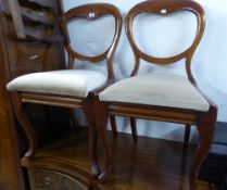 A PAIR OF VICTORIAN MAHOGANY BALLOON BACK SINGLE CHAIRS, ON CABRIOLE FRONT SUPPORTS