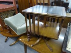 A REPRODUCTION MAHOGANY COFFEE TABLE/BOOK STAND, HAVING GREEN LEATHER INSET TOP OVER OPEN