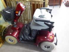 A FREERIDER FOUR WHEEL BATTERY DRIVEN MOBILITY SCOOTER (SOLD AS SEEN)