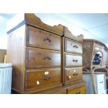 A PAIR OF PINE THREE DRAWER BEDSIDE CHESTS