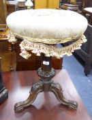 EARLY VICTORIAN CARVED ROSEWOOD ADJUSTABLE PIANO STOOL, the padded, circular seat, with floral