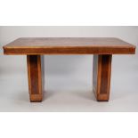 A STYLISHLY ART DECO POLLARD OAK AND SYCAMORE DINING TABLE, the top with rounded corners above a