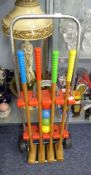 A GARDEN CROQUET SET