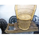 AN OLD WOODEN SLEDGE AND A WICKER CHILD'S ARMCHAIR (2)