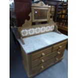 A VICTORIAN PINE WASHSTAND, HAVING DRESSING TABLE SWING MIRROR, OVER RAISED TILE BACK, GREY VEINED
