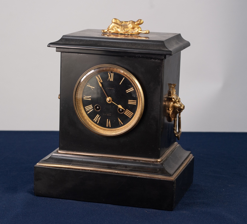 LATE NINETEENTH CENTURY BLACK SLATE AND GILT METAL MANTLE CLOCK, the 4" Roman dial, indistinctly