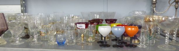 A QUANTITY OF CUT GLASS SAND OTHER STEM WINE GLASSES