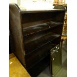 A BLACK STAINED WOOD FIVE TIER OPEN BOOKCASE