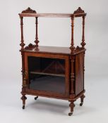 MID VICTORIAN BURR WALNUT AND CARVED MUSIC CANTERBURY WHAT-NOT, the rounded oblong top surmounted by
