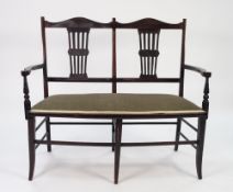 EDWARDIAN DARK STAINED MAHOGANY DRAWING ROOM DOUBLE CHAIR BACK SETTEE, with shaped top rail above