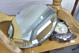 A SHAPED CIRCULAR BEVELLED EDGE FRAMELESS WALL MIRROR AND A MODERN FANCY CASE WALL CLOCK AND A