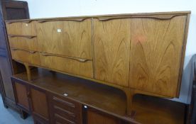 SUTCLIFFE, TODMORDEN TEAK SIDEBOARD HAVING OUT TURNED EDGE HANDLES, CENTRAL FALL FRONT OVER LONG