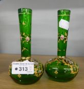 A PAIR OF GREEN AD GILT SMALL GLOBE AND SHAFT SHAPED VASES