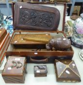 LEATHER SUITCASE CONTAINING VARIOUS WOODEN ITEMS TO INCLUDE; PLAQUE WITH FEMALE FIGURE, BOXES, HIPPO