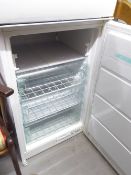 AN INTEGRATED UPRIGHT FREEZER