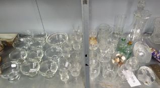 A QUANTITY OF DRINKING GLASSES AND A GLASS DECANTER