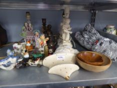 SMALL CERAMIC CARTOON CHARACTERS, A CHINA FIGURAL TABLE LAMP, A HEAVY SEATED DOG ETC......