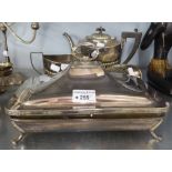 AN ELECTROPLATE TEA SERVICE OF 3 PIECES AND AN OVEN GLASS OBLONG ENTREE DISH WITH EP. TWO HANDLED