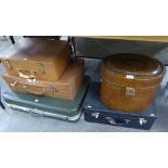 FOUR VARIOUS SUITCASES AND A METAL HAT BOX