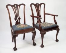 SET OF EIGHT EARLY TWENTIETH CENTURY CARVED MAHOGANY DINING CHAIRS (6+2) IN THE CHIPPENDALE STYLE,