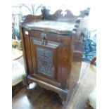AN ANTIQUE MAHOGANY COAL PURDONIUM WITH FALL FRONT AND GALLERY BACK