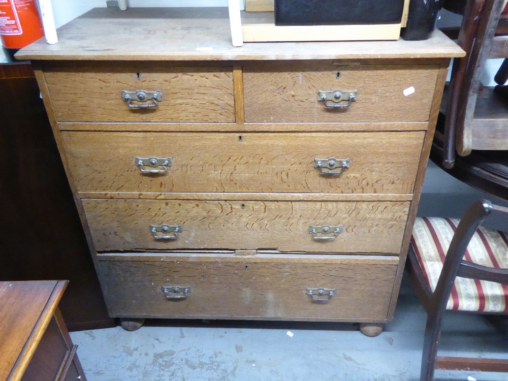 A LATE VICTORIAN OAK CHEST OF DRAWERS