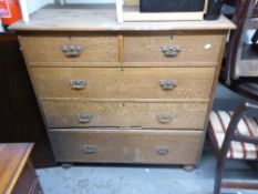 A LATE VICTORIAN OAK CHEST OF DRAWERS